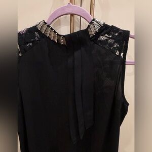 Chic Black Sleeveless Blouse with Lace Accents